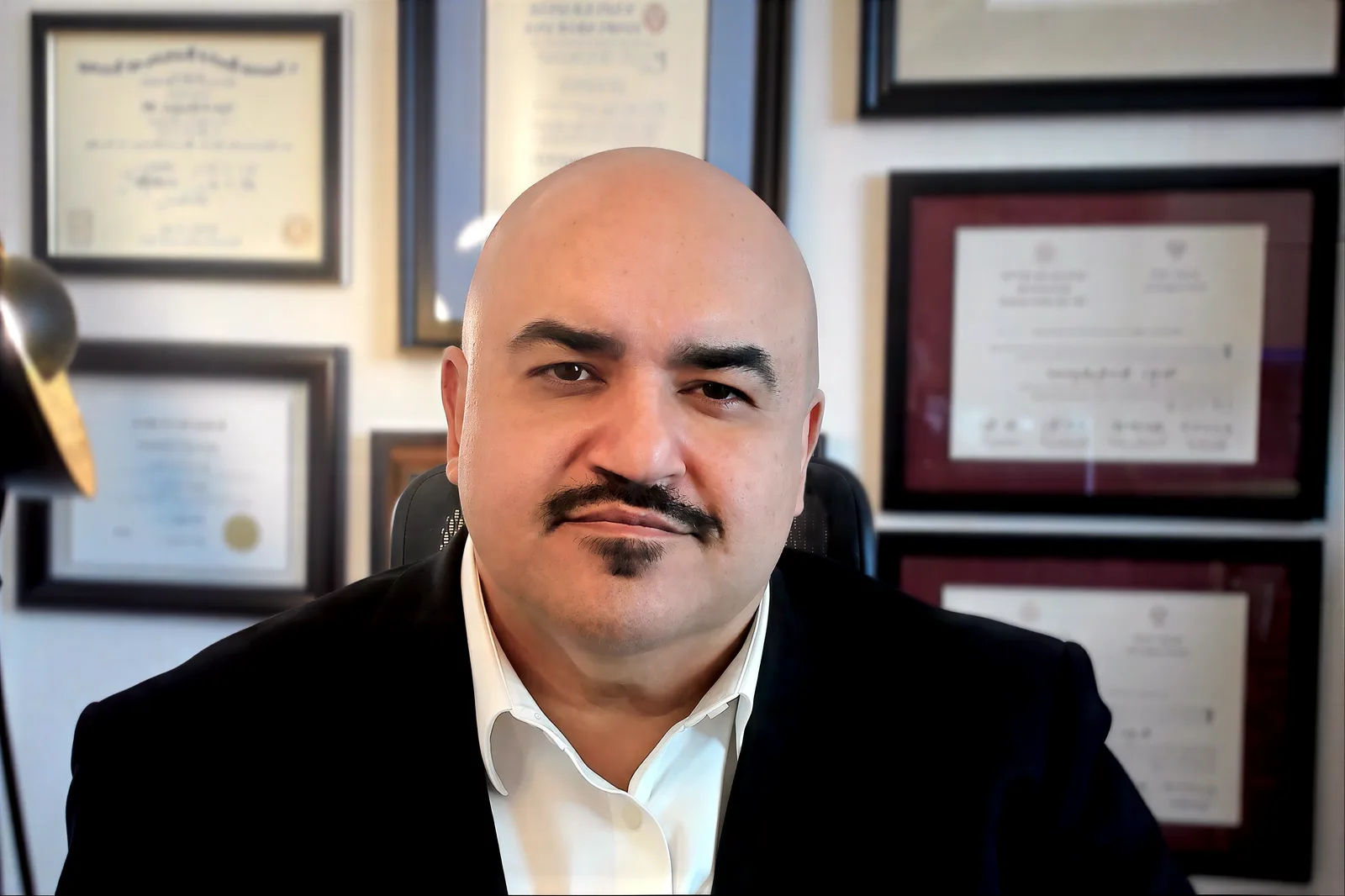 Dr. Angelo Sadeghpour in his office